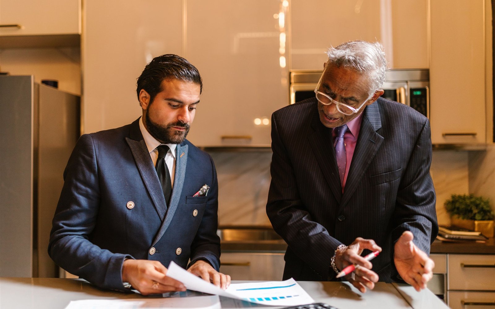 Business professionals reviewing financial planning documents